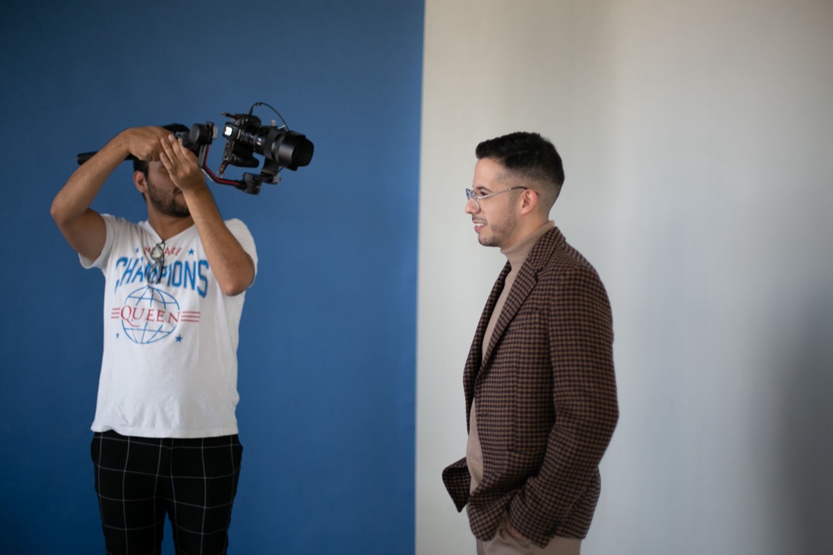 Director interviewing in movie set