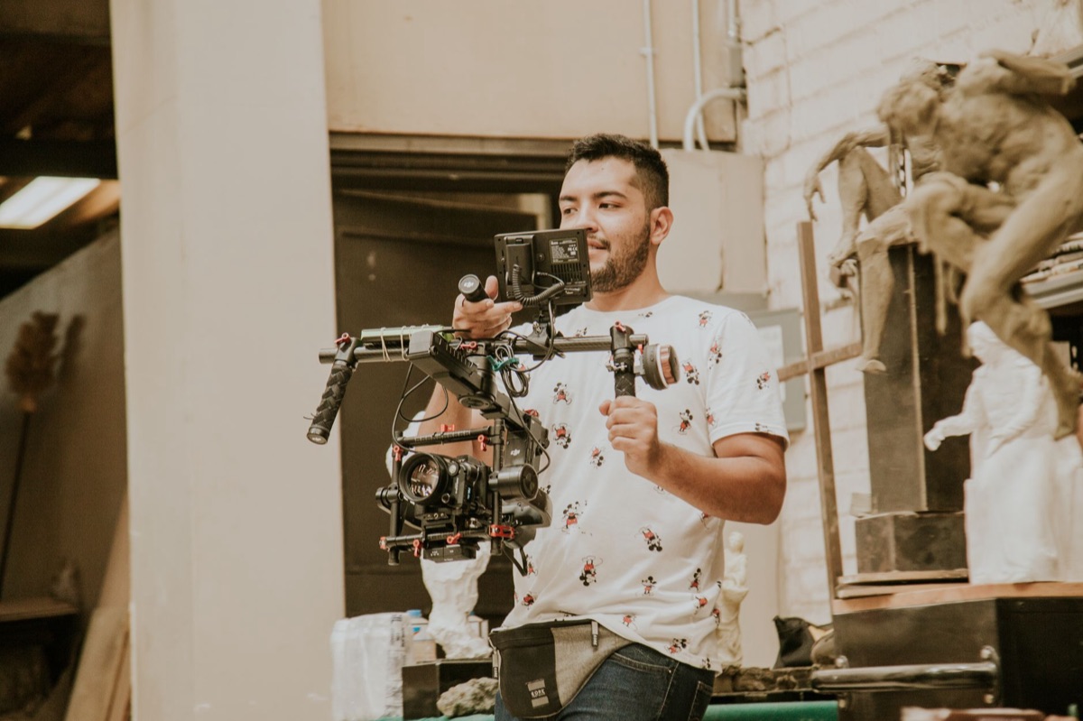 Film set with crew preparing for a Korean movie release