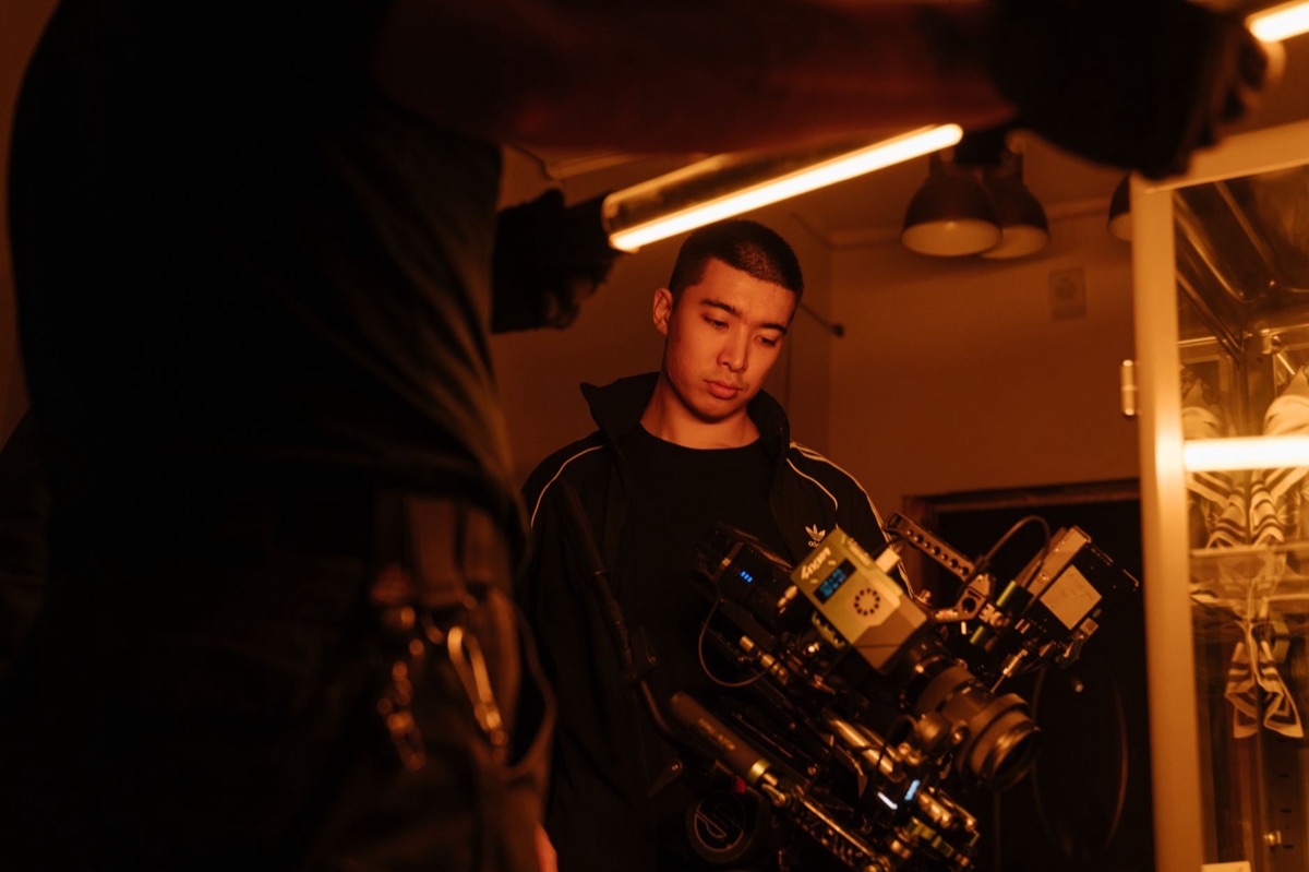 Stunt actor in action gear during filming