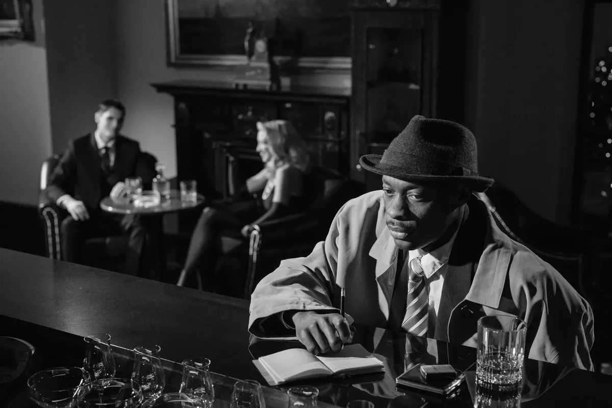 Noir-inspired scene with a detective taking notes in a dimly lit lounge, capturing suspense.